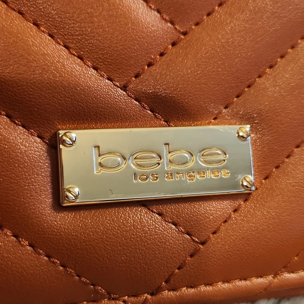 Bebe quilted bag with Gold rope chain cross body bag. Gently Used - Picture 4 of 16